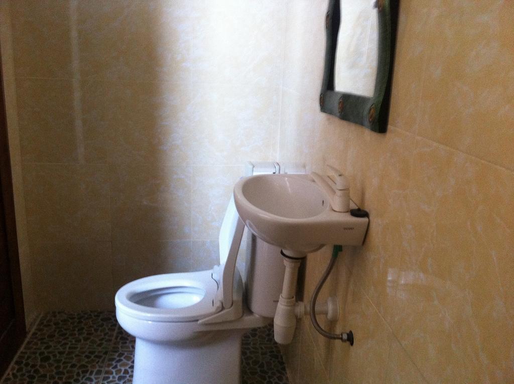 Amed Sari Beach Guesthouse Kamer foto