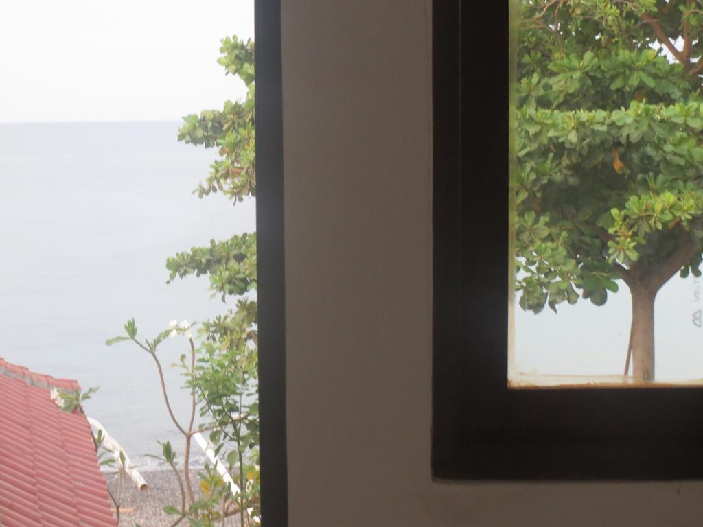 Amed Sari Beach Guesthouse Buitenkant foto