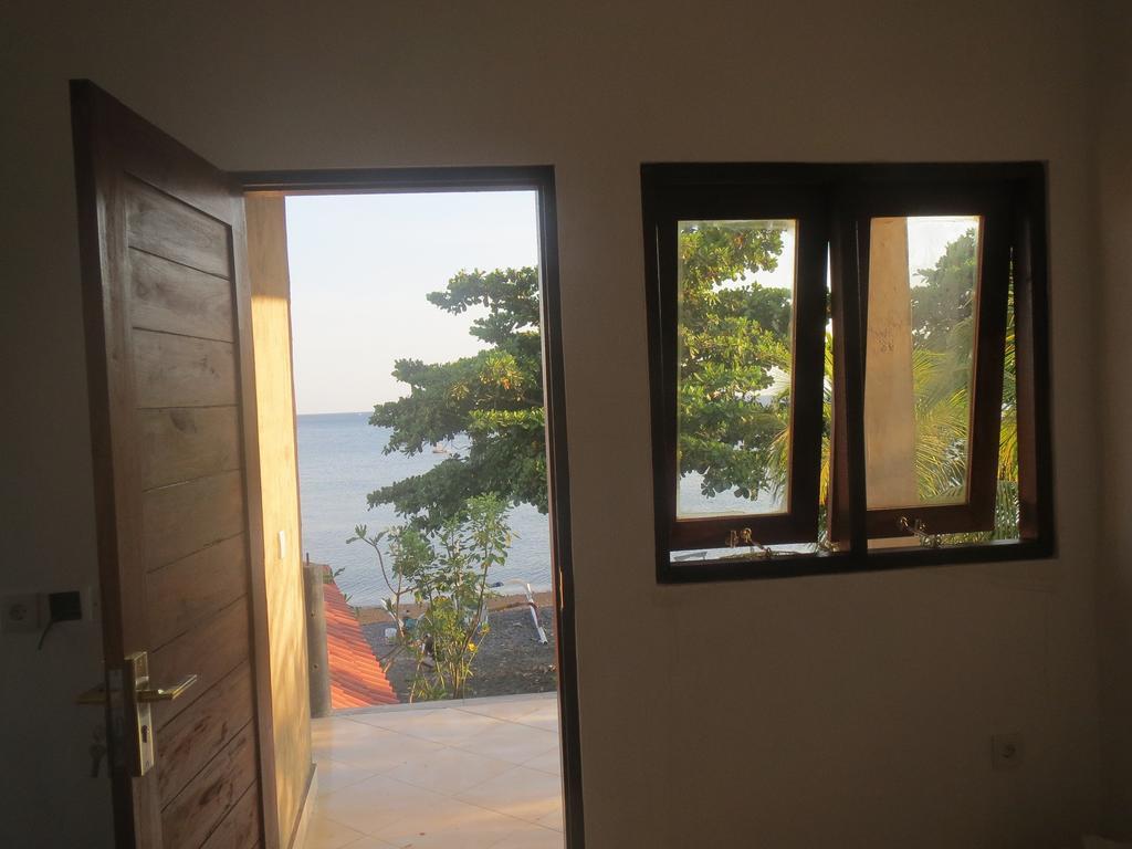 Amed Sari Beach Guesthouse Buitenkant foto