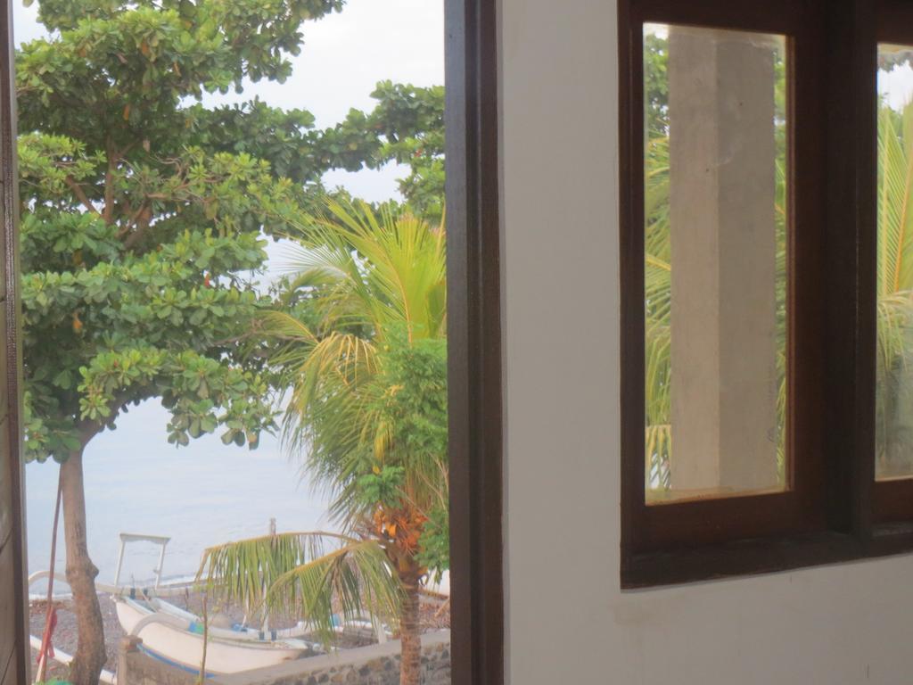 Amed Sari Beach Guesthouse Kamer foto